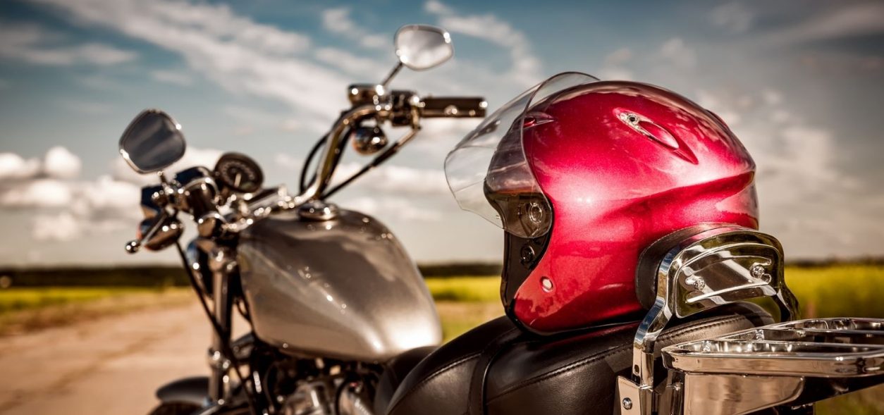 Motorcycle with helmet on the road.