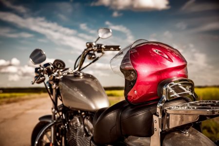 Motorcycle with helmet on the road.