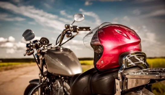 Motorcycle with helmet on the road.