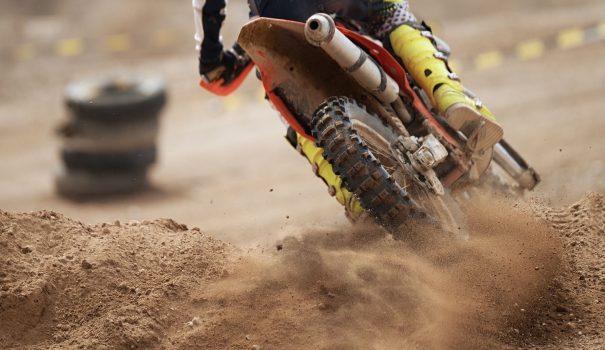 Person riding a dirt bike.